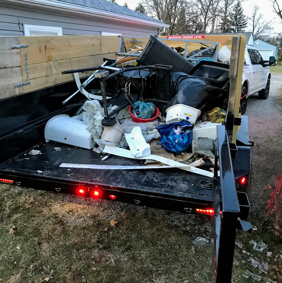 Roll-off dumpster delivered to a residential driveway in Attalla
